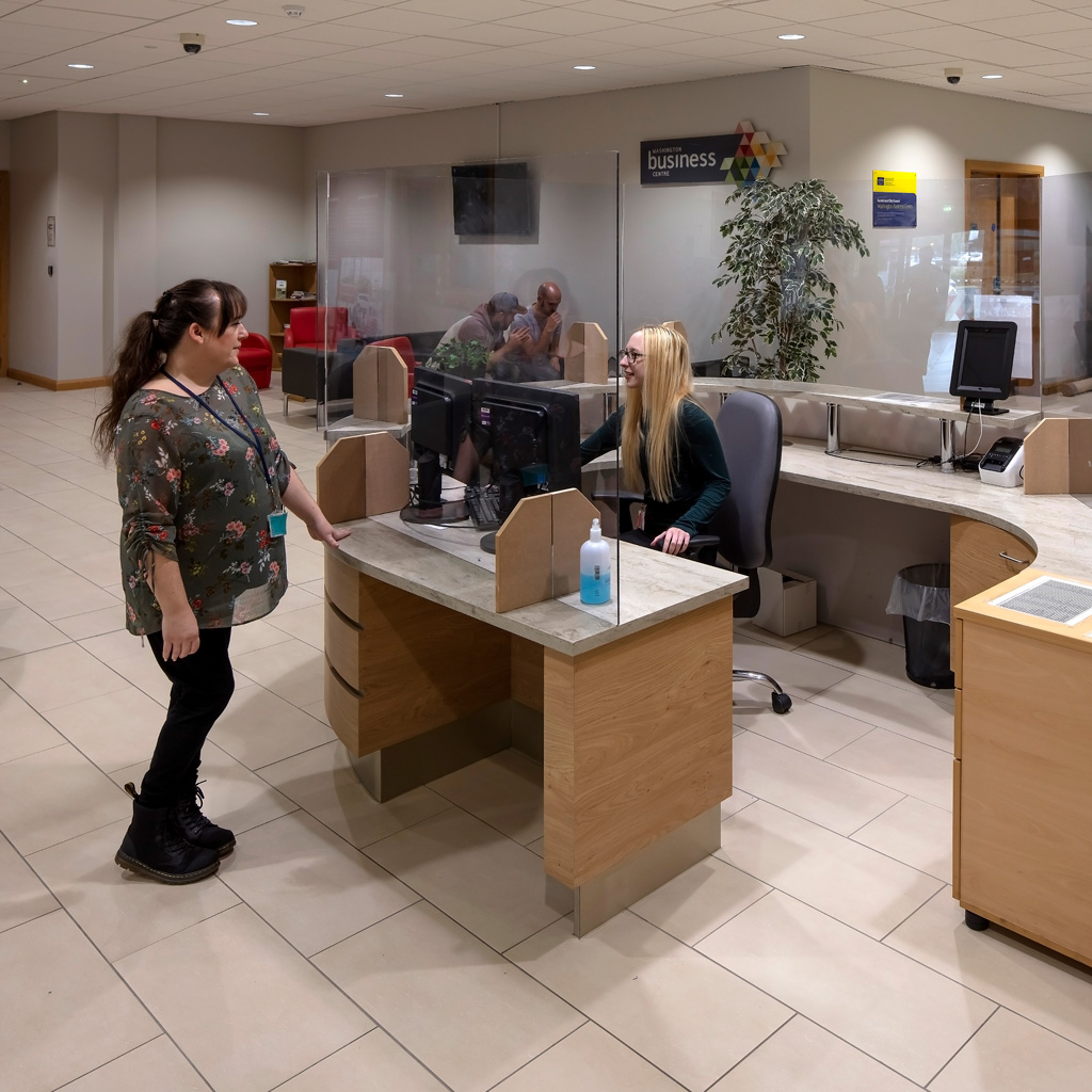 Welcoming visitors at reception area